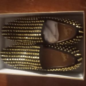 Golden Christian Louboutin dandelion spikes